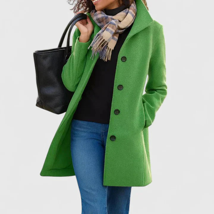 Bright green long coat with button front, notched lapels, and side pockets