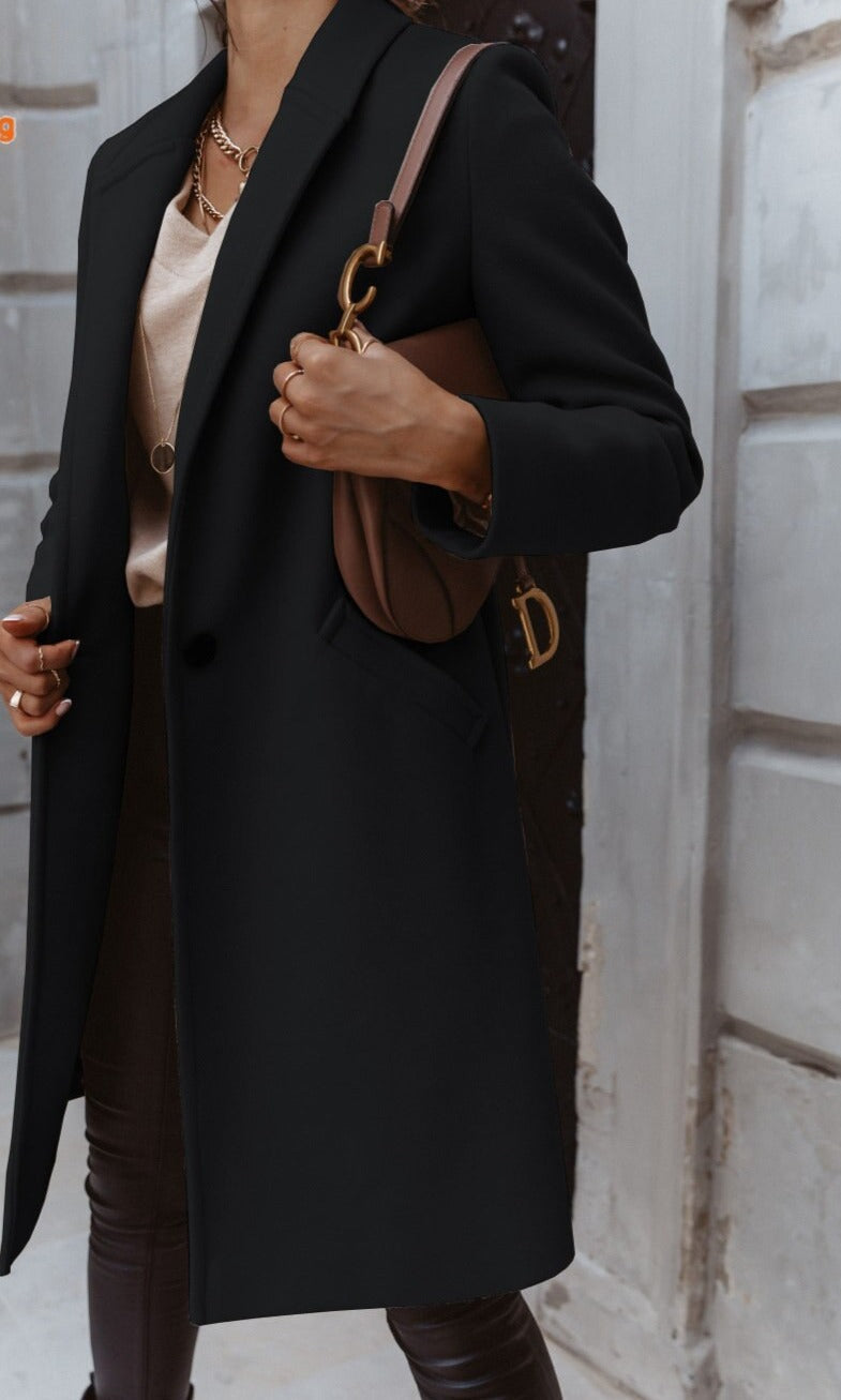 Women’s formal button-front coat, black long coat with lapels and front buttons.
