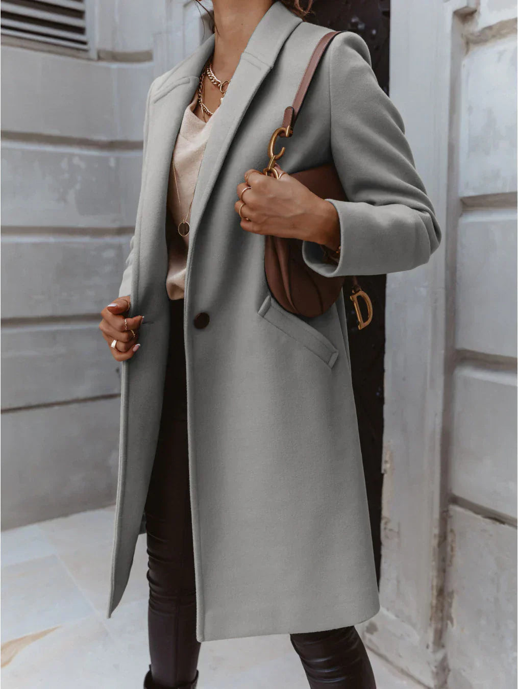 Women’s formal button-front coat, grey long coat with lapels and front button closure.