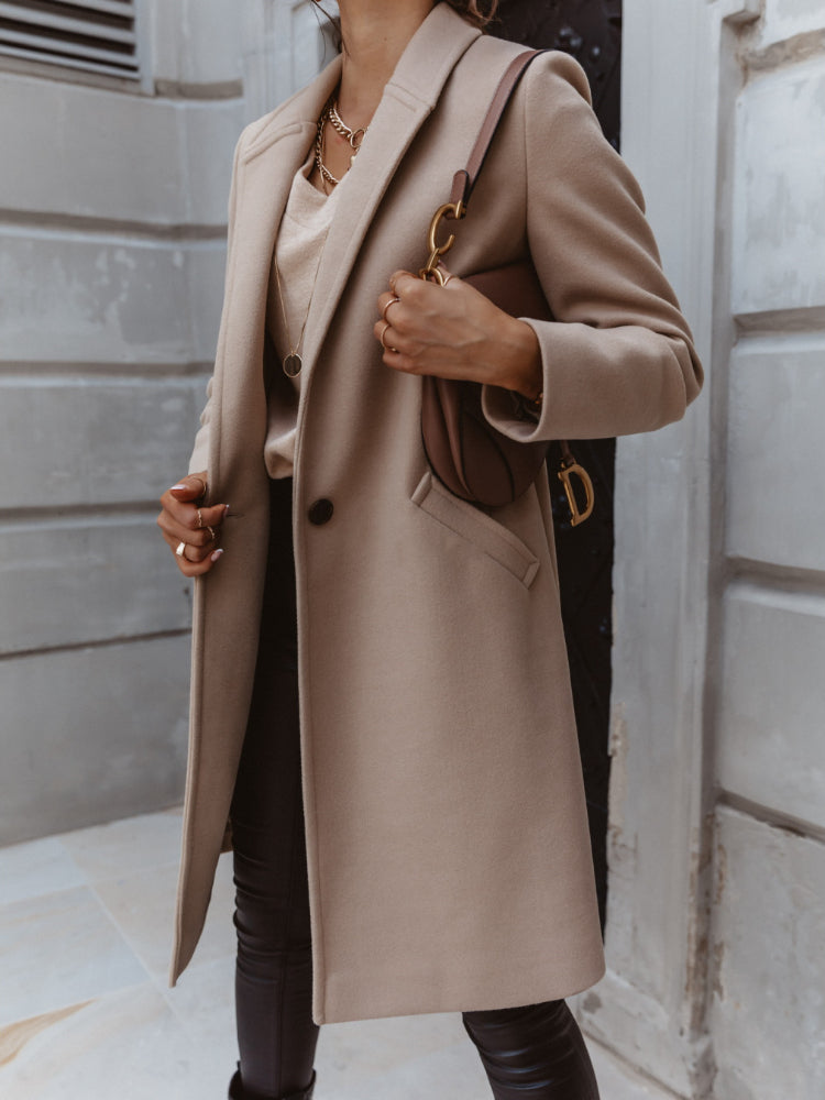 Women’s formal button-front coat, apricot long coat with lapels and front button closure.