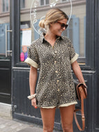 Brown leopard print romper jumpsuit with short sleeves and button-up collar