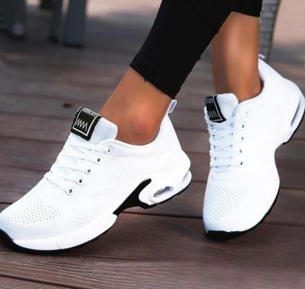 Comfortable everyday white knit sneakers with black logo accents and white sole