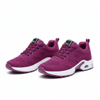 Purple breathable knit sneakers with lace-up design and cushioned sole, white side accents