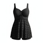 Women's black sleeveless swim one-piece with drawstring waist and skirted hem overlay
