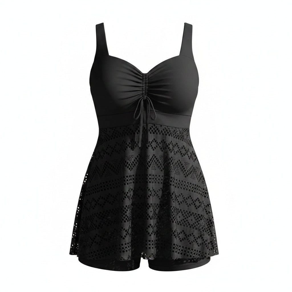 Women's black sleeveless swim one-piece with drawstring waist and skirted hem overlay