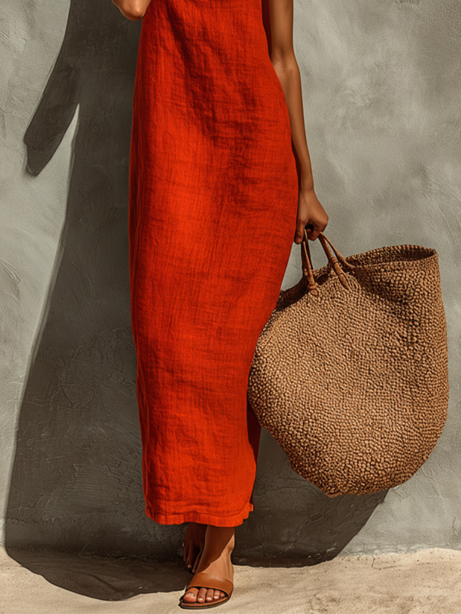 Red sleeveless square-neck maxi dress with spaghetti straps, full-length hem