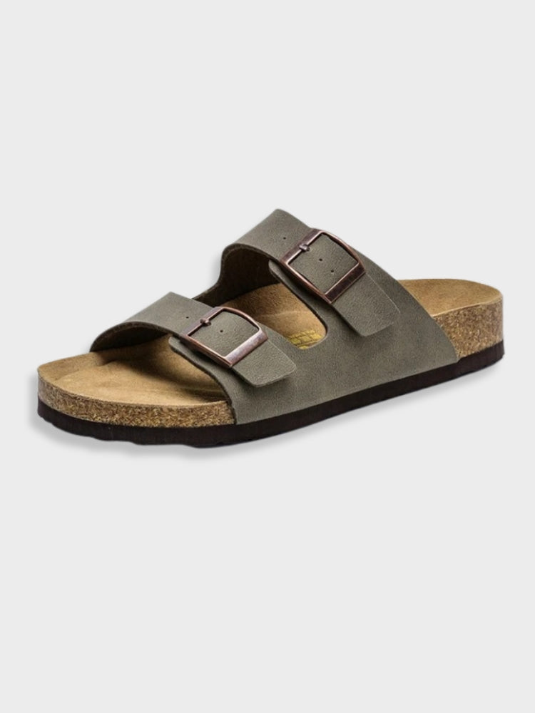 Dark gray adjustable buckle slide sandals with two buckled straps and cork insole