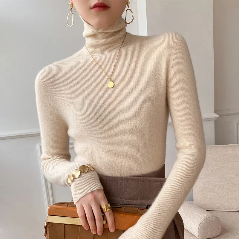 Ivory slim fit turtleneck sweater with long sleeves and ribbed knit cuffs