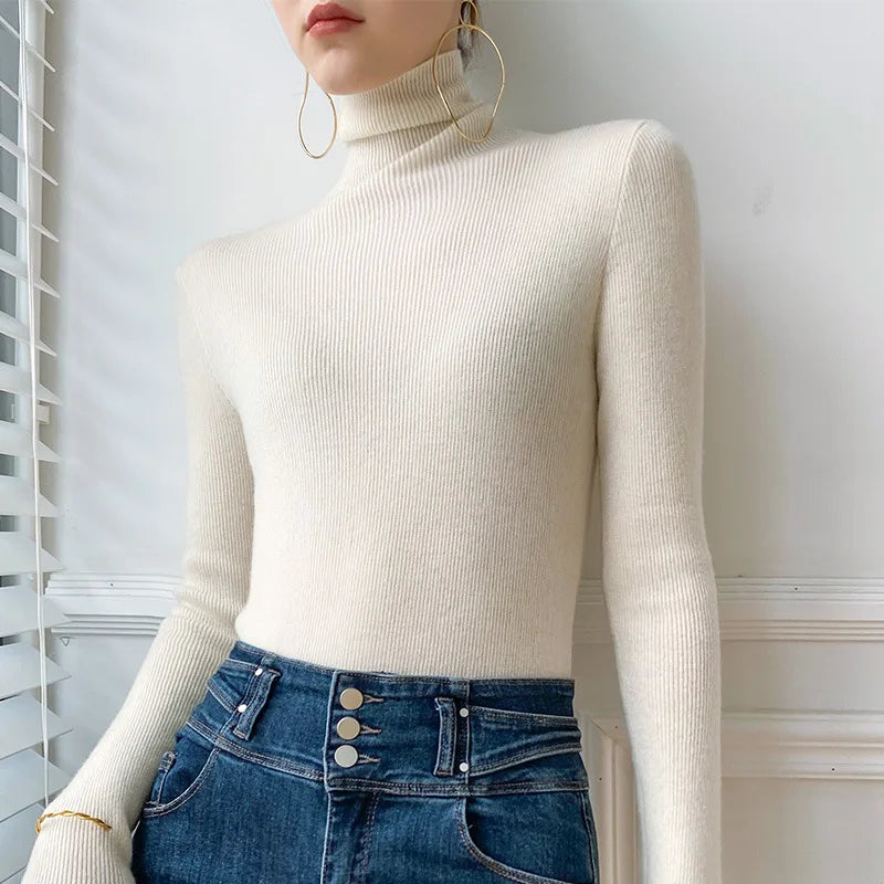 Cream slim fit turtleneck sweater with long sleeves and smooth ribbed collar
