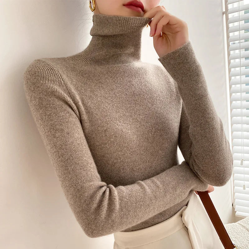 Taupe slim fit turtleneck sweater with long sleeves and ribbed knit finish
