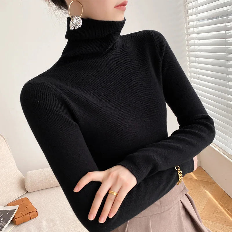 Black slim fit turtleneck sweater with long sleeves and ribbed high collar