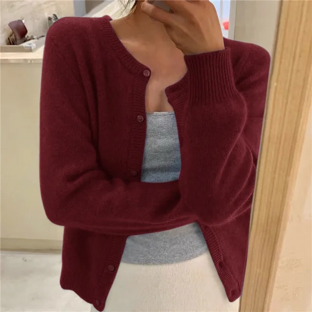 Burgundy women's cropped knit cardigan with button front and ribbed hem.