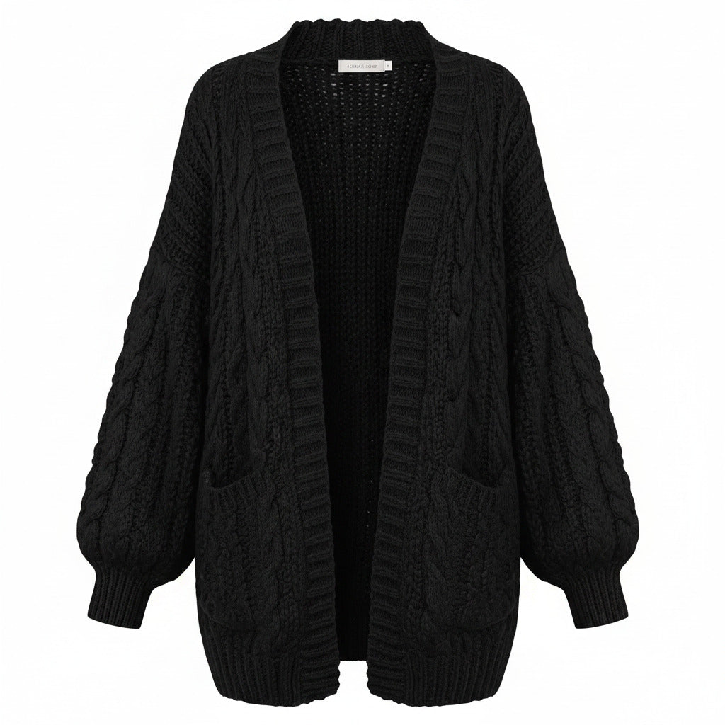 Black chunky knit open cardigan with long sleeves and textured cable-style knit