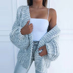 Sky blue chunky knit open cardigan with long sleeves and textured cable-style knit