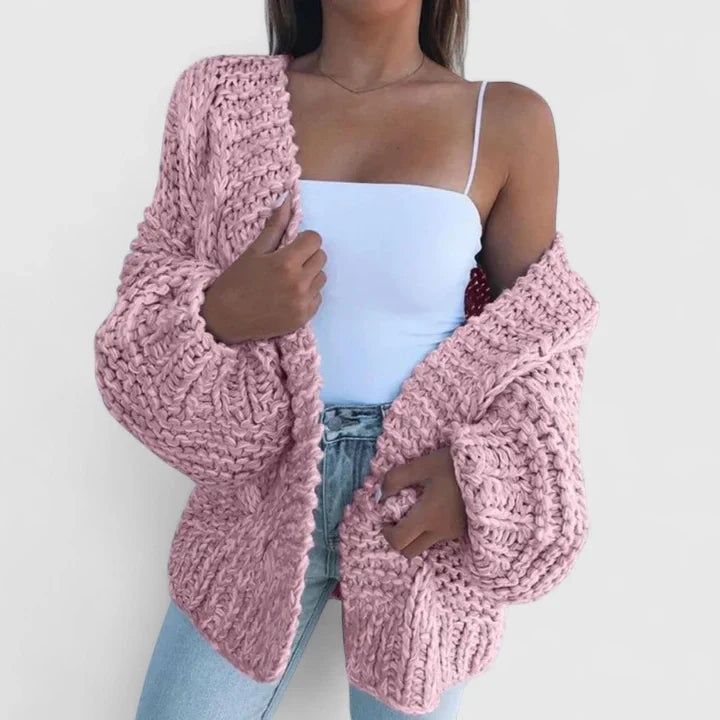 Pink chunky knit open cardigan with long sleeves and thick textured knit