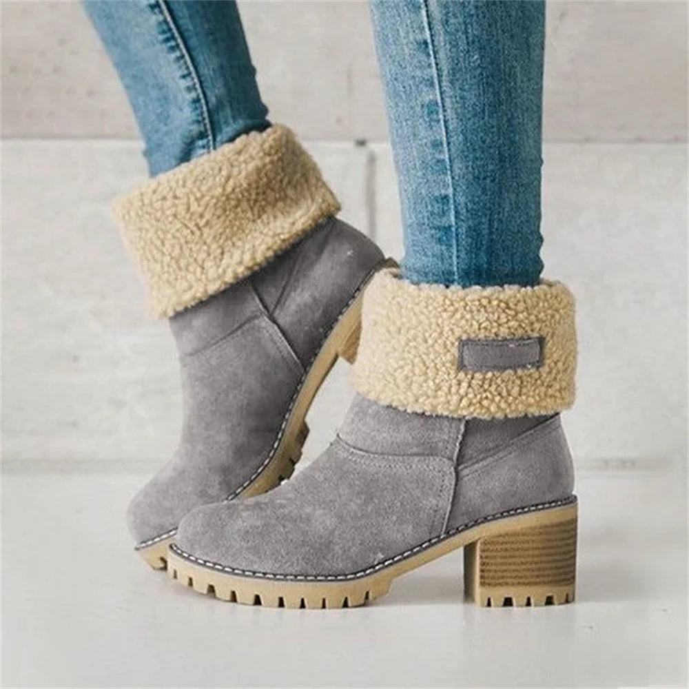Women’s ankle boots in gray suede with cream faux shearling cuff and chunky heel.