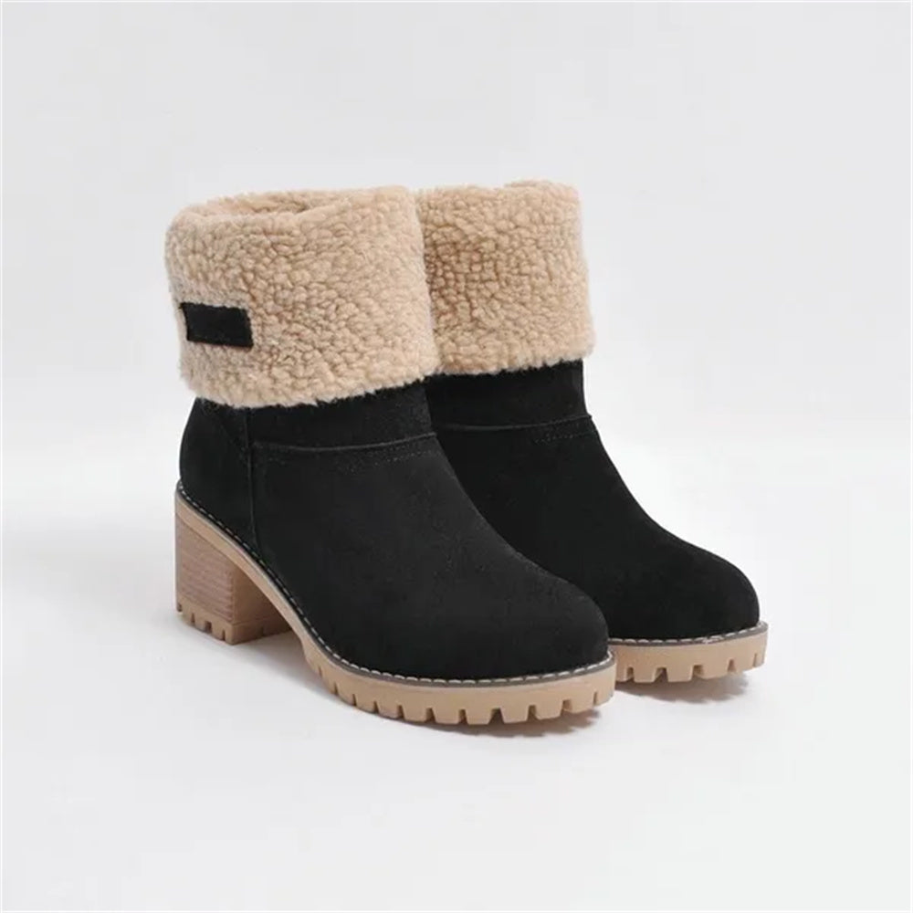 Women's ankle boots with faux shearling cuffs, black uppers, block heel, treaded sole