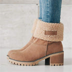 Women’s ankle boots with tan suede finish, faux shearling cuff, and lug sole heel.