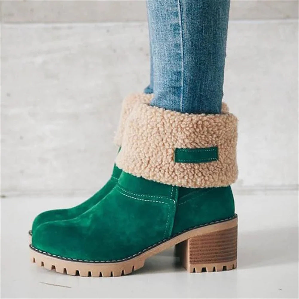 Women’s ankle boots in dark green suede with cream faux shearling cuff and block heel.