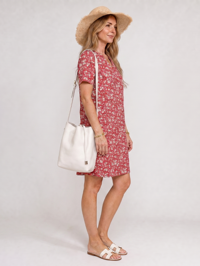 Red short-sleeve knee-length V-neck dress with white floral print and flared skirt