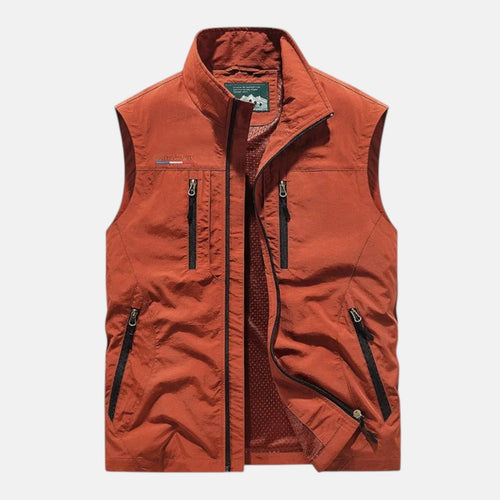 Rust-red breathable cargo vest, sleeveless full-zip with stand collar and zip pockets