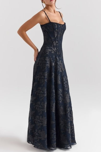 Black floral chiffon maxi dress, side view with spaghetti straps and fitted bodice