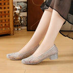 Silver glitter slip-on pumps with block heel and pointed toe