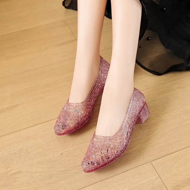 Pink glitter slip-on pumps with block heel and pointed toe
