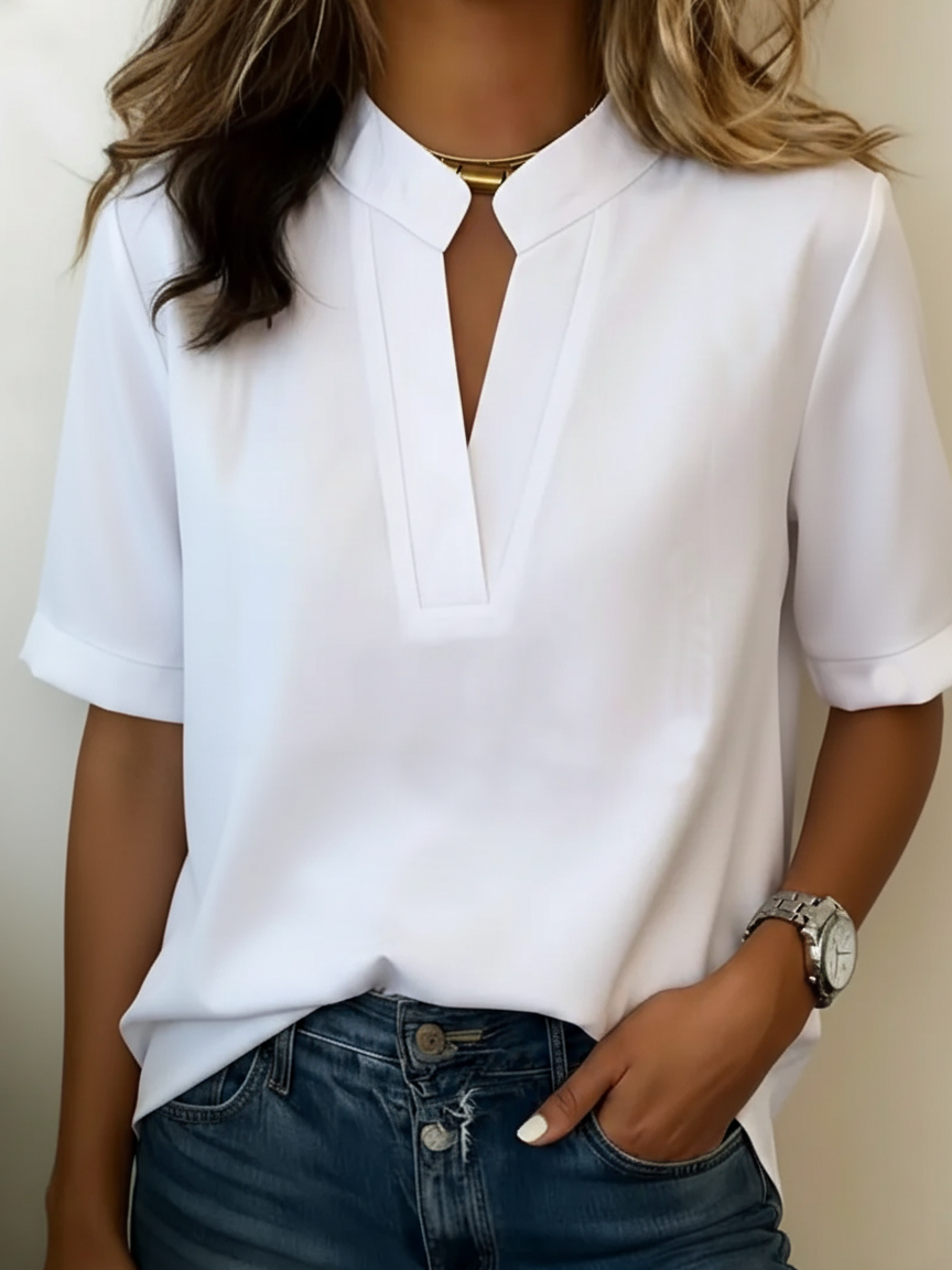 White split-neck blouse with short sleeves and V-style neckline panel