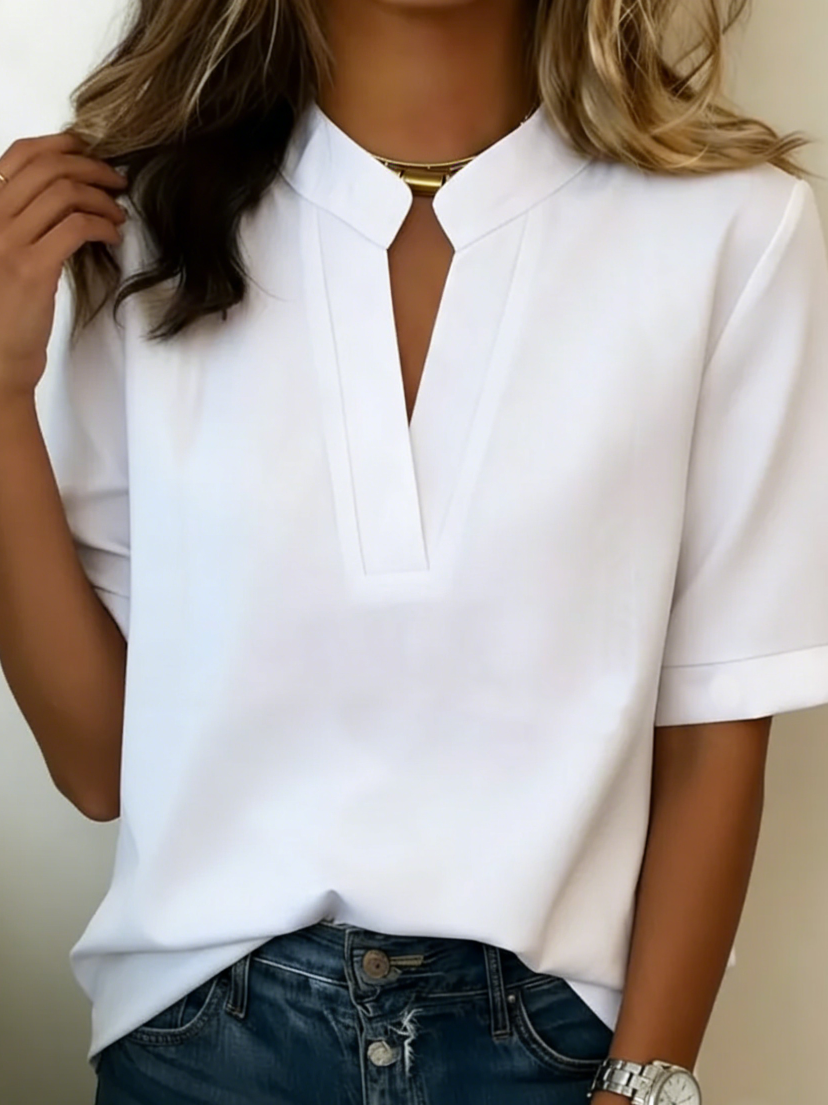 Women's structured collar split-neck short-sleeve blouse close-up, white