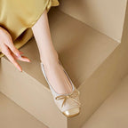 Antique gold square-toe ballet flats with bow ties and low flat sole