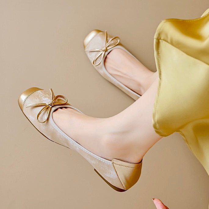 Silver square-toe ballet flats with bow ties and gold-toned toe accents