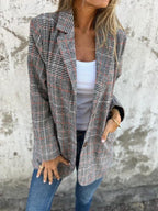Checked blazer coat with notch lapels and long sleeves, black-gray plaid with red accents