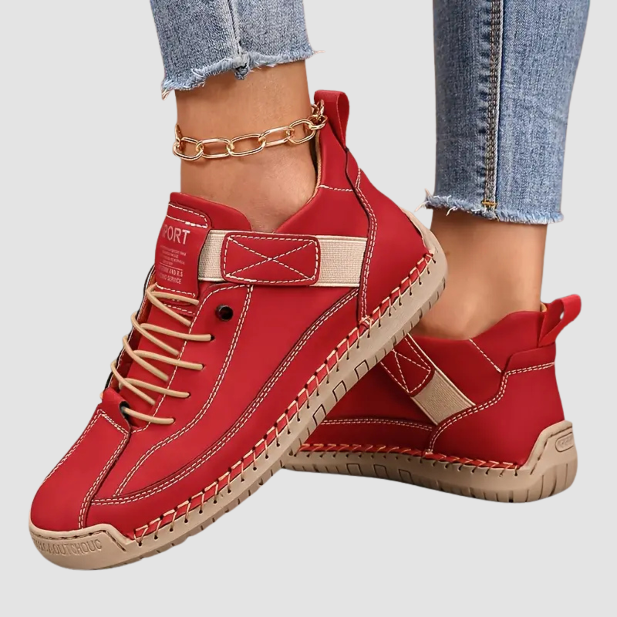 Women's red cushioned leather lace-up sneakers with stitched trim and grippy sole