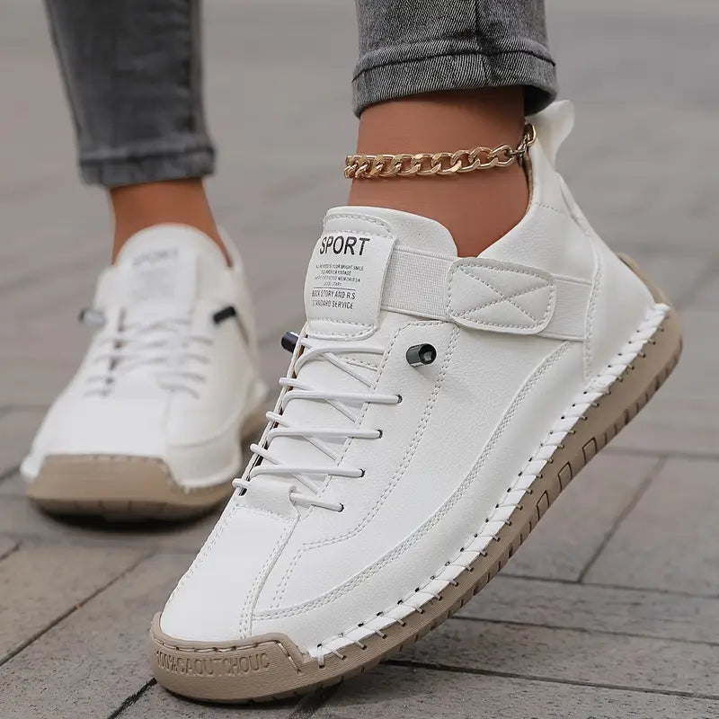 Women's white cushioned leather lace-up sneakers with side velcro strap and textured sole