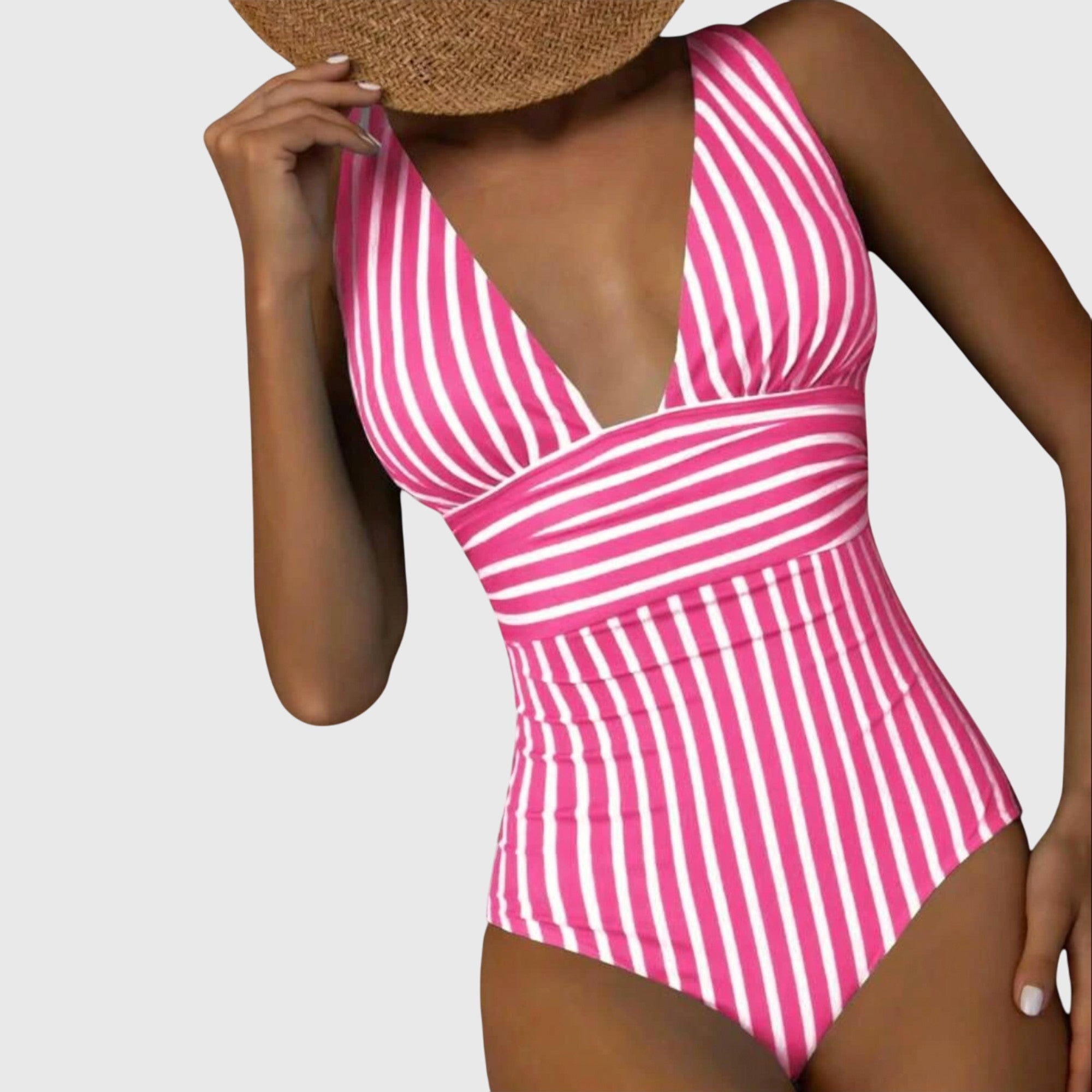 Women’s striped deep V-neck one-piece swimsuit in pink and white vertical stripes