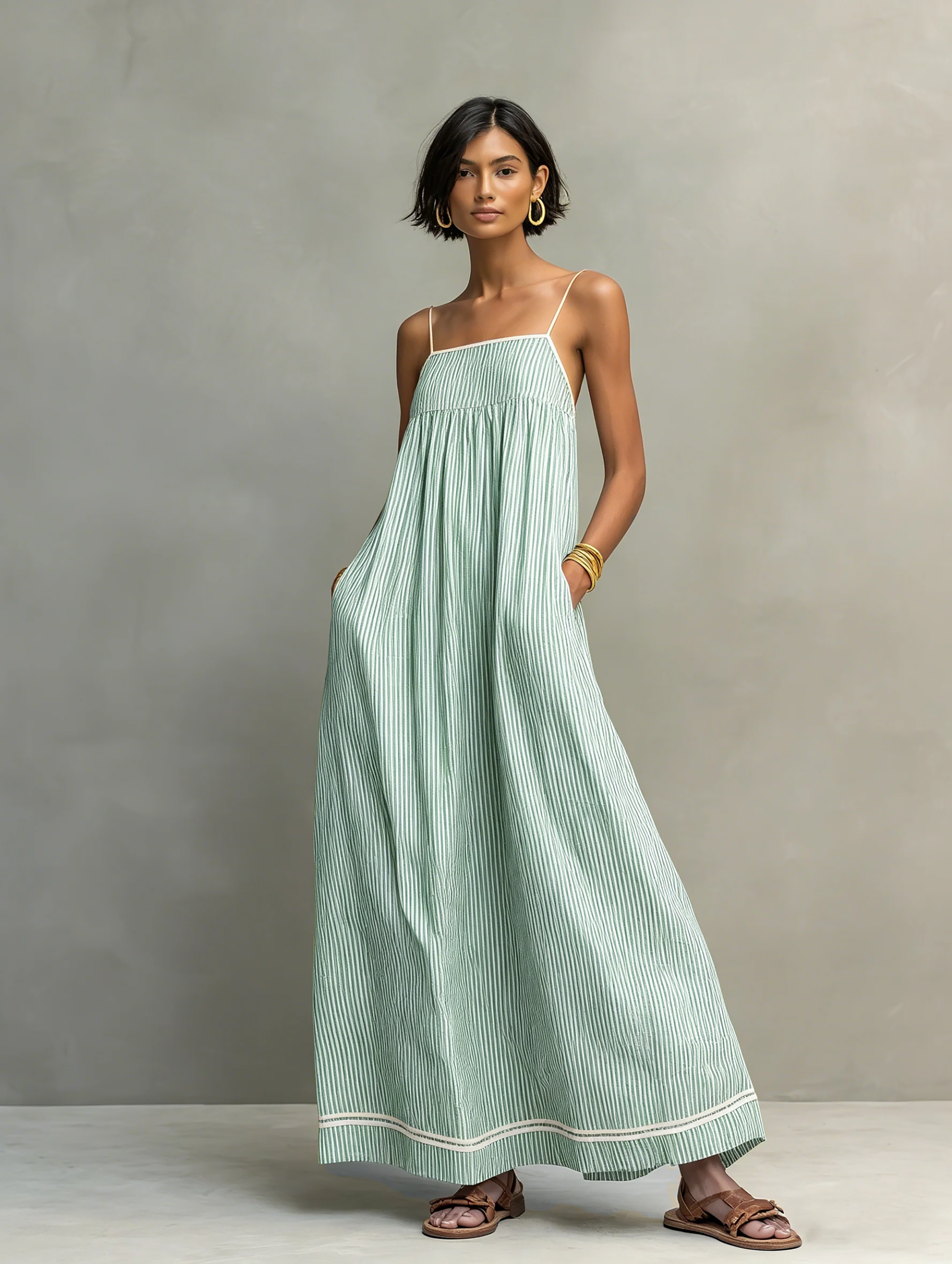 Green striped spaghetti-strap maxi dress with gathered bodice and red-trim hem