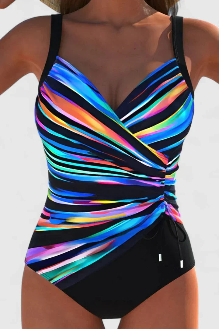 One-piece striped wrap swimsuit with multicolor bands, ruched waist, side tie