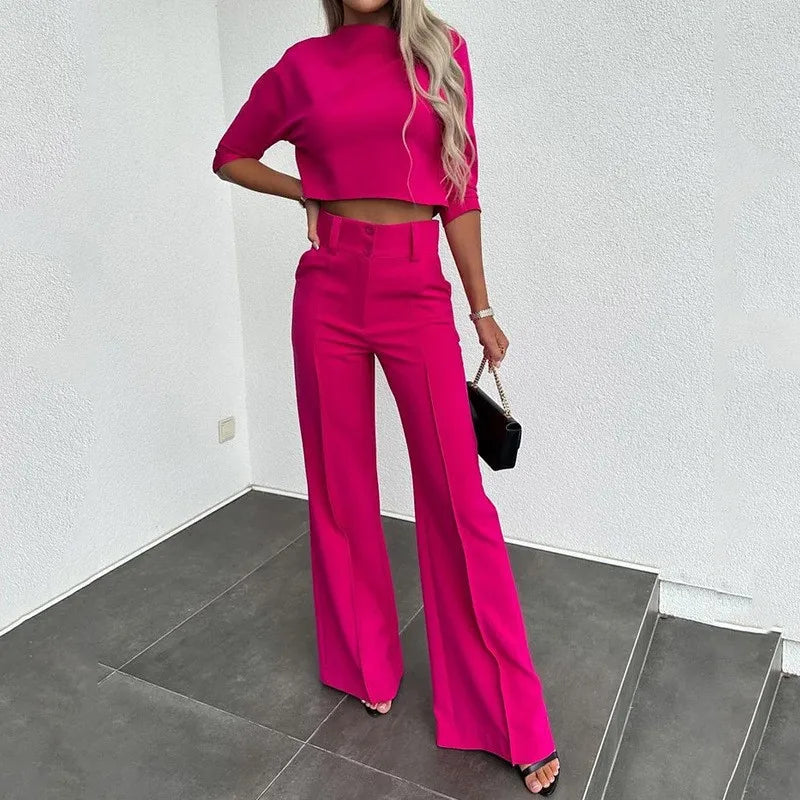 Fuchsia matching cropped top and high-waist wide-leg trousers with belt loops and pockets