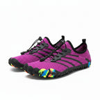 Purple unisex water shoes with flexible barefoot fit, lace-up straps, grippy sole