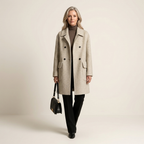 Beige double-breasted wool-blend coat with structured collar, flap pockets, oversized fit