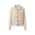 Beige knit cardigan with button front, long sleeves, and ribbed cuffs.