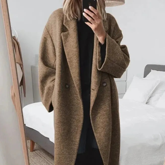 Brown long women's relaxed-fit coat with button front and wide sleeves
