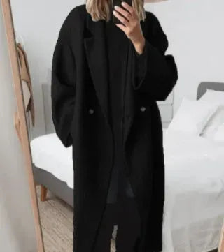 Black long women's relaxed-fit coat with button front and oversized sleeves
