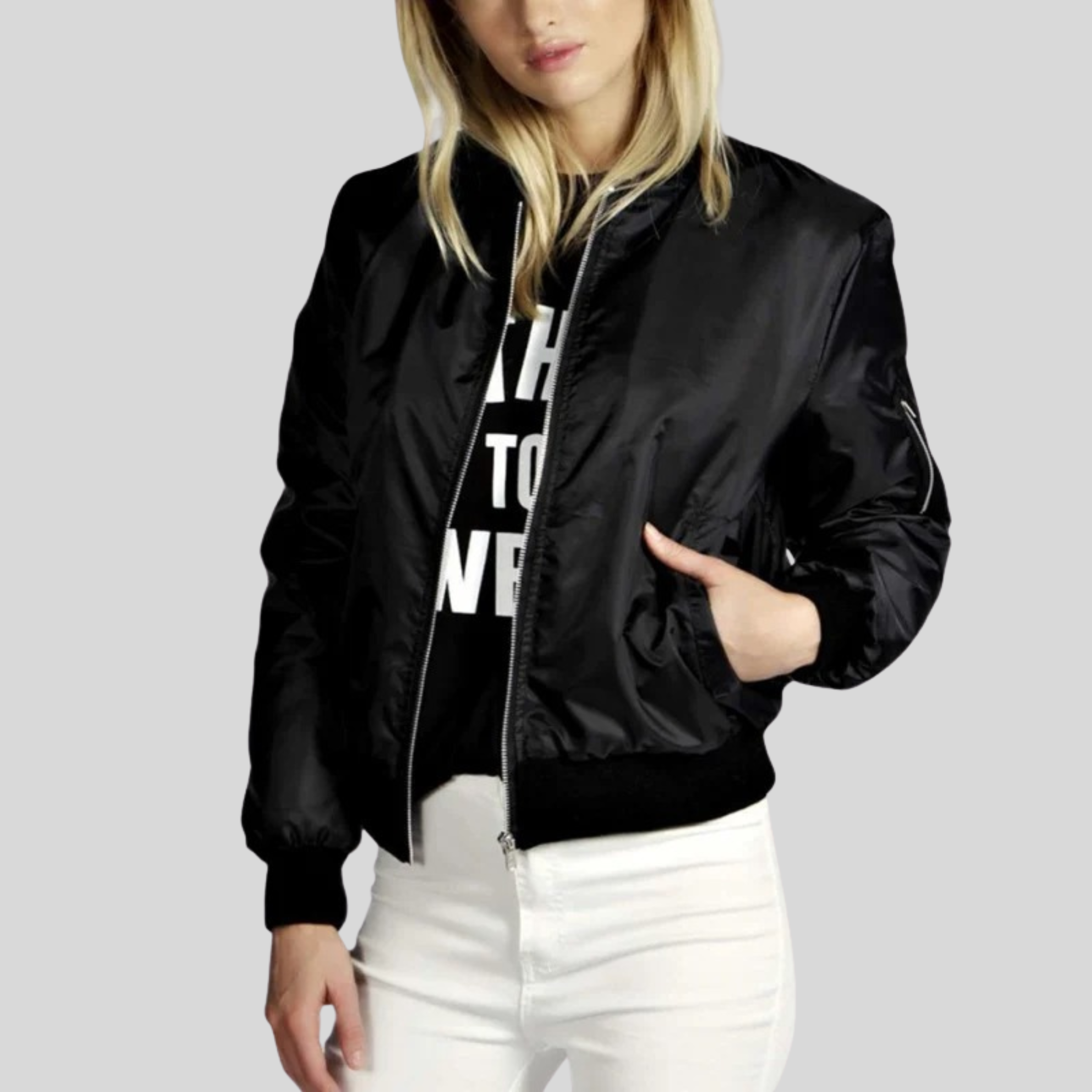 Women's black zip-up bomber jacket with ribbed cuffs and waistband