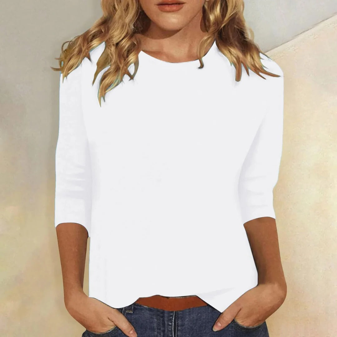 Women’s solid crew neck top with three-quarter sleeves, relaxed straight fit, white