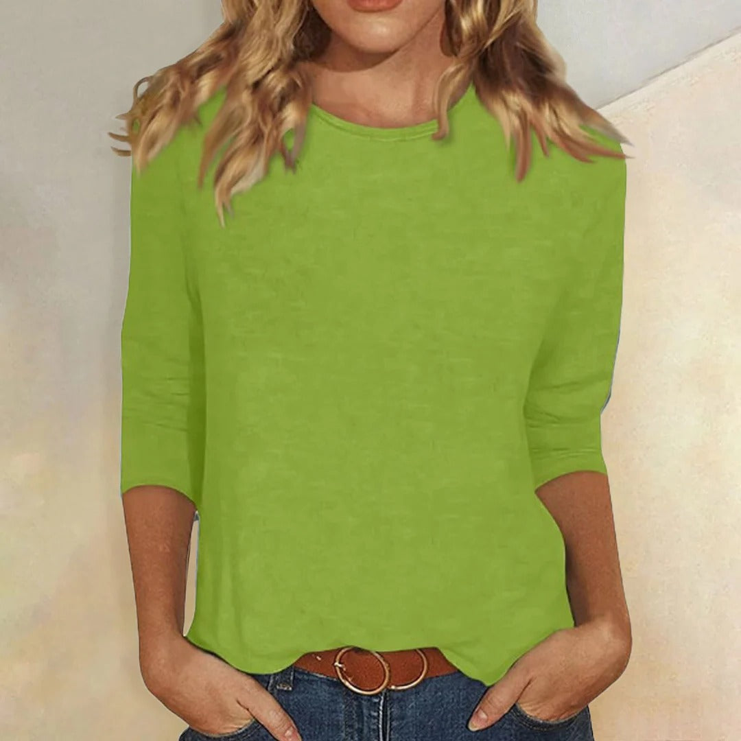 Women’s solid crew neck top with three-quarter sleeves, relaxed straight fit, bright green