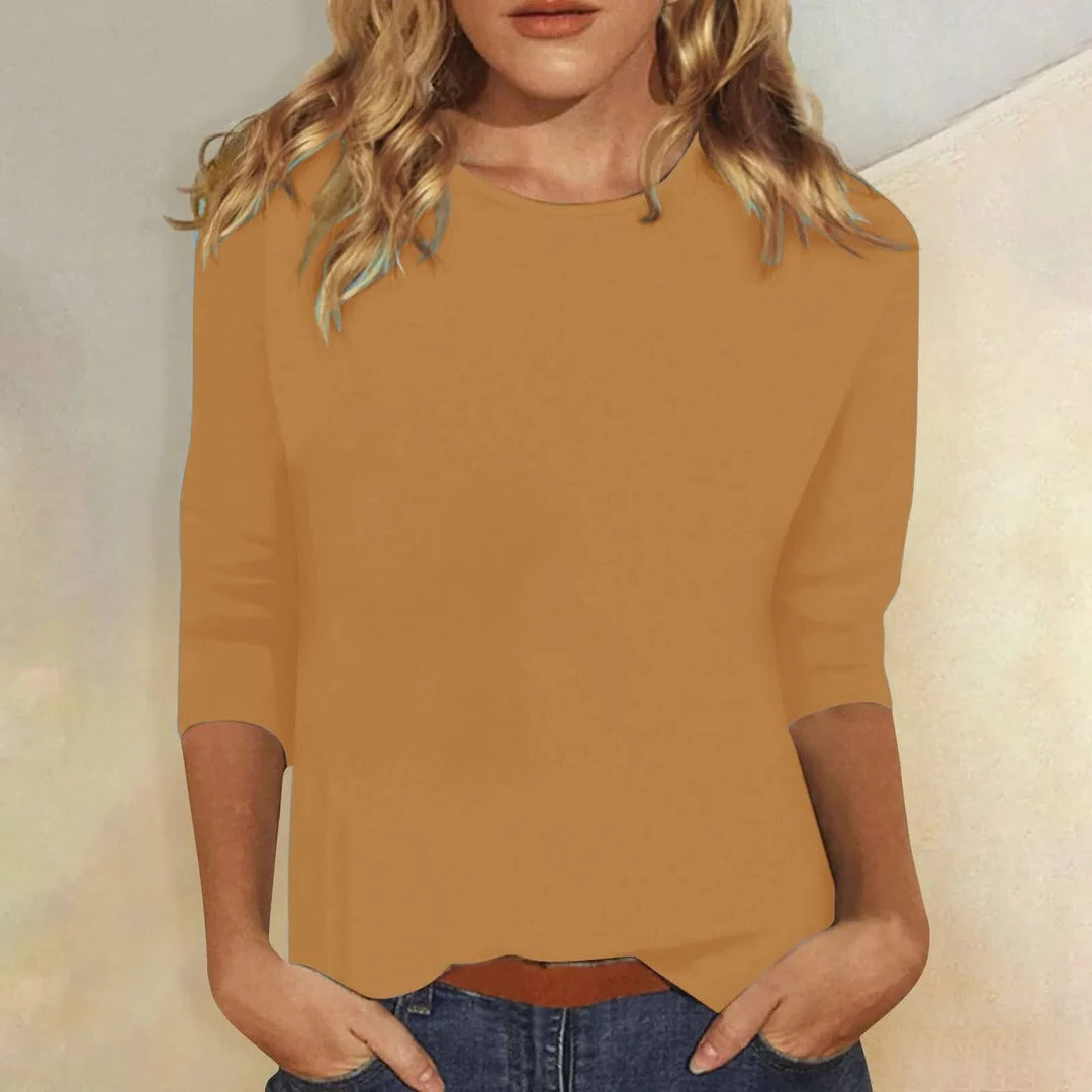 Women’s solid crew neck top with three-quarter sleeves, relaxed straight fit, camel