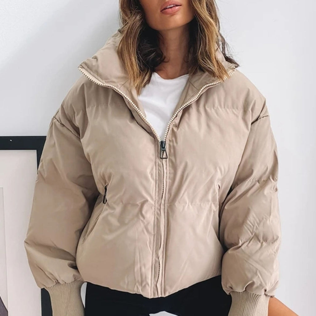 Beige cropped puffer jacket with full zip and ribbed cuffs