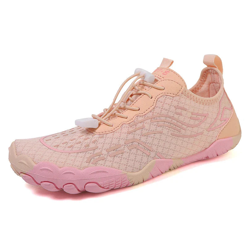 Pink low-top lace-up barefoot shoes with flexible tread sole and mesh-textured upper.